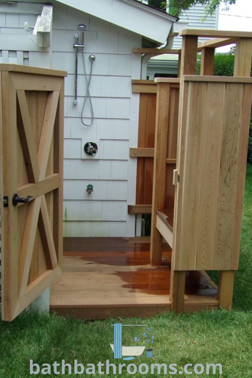 A wooden outhouse on a lush green field, showcasing cozy outdoor shower and toilet design ideas. This charming setup exemplifies outdoor shower inspirations for a cozy home atmosphere. Discover more unique ideas at bathbathrooms.com.