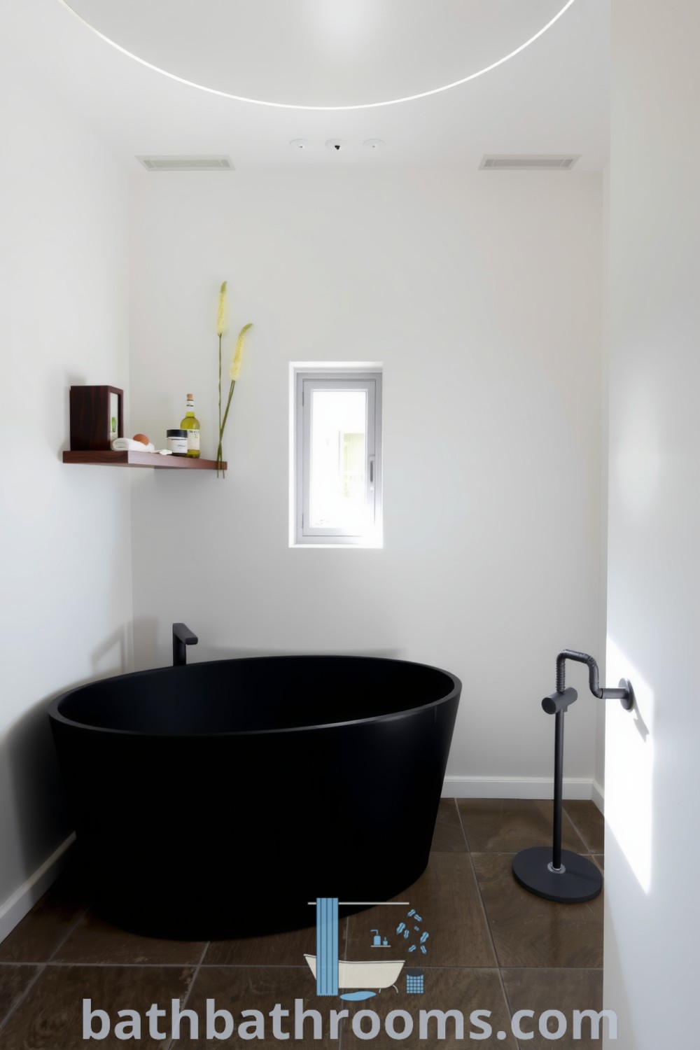 Minimalist bathroom featuring a black freestanding tub, smooth white walls, stone flooring, and wooden accents. The design promotes relaxation with a cozy aesthetic and practical decor ideas. Discover more unique ideas for your home at bathbathrooms.com.