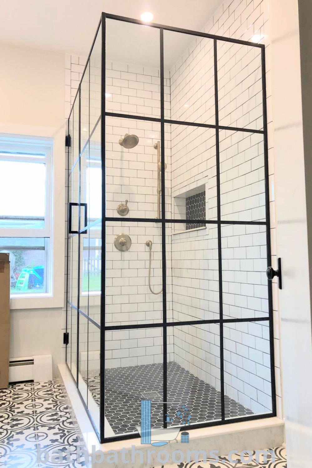 A modern bathroom featuring a black frame shower enclosure with two-sided glass doors, providing stylish functionality. The black panel shower door and enclosure create a stunning focal point, ideal for small spaces and maximizing design elegance. Discover more cozy decor ideas at bathbathrooms.com.
