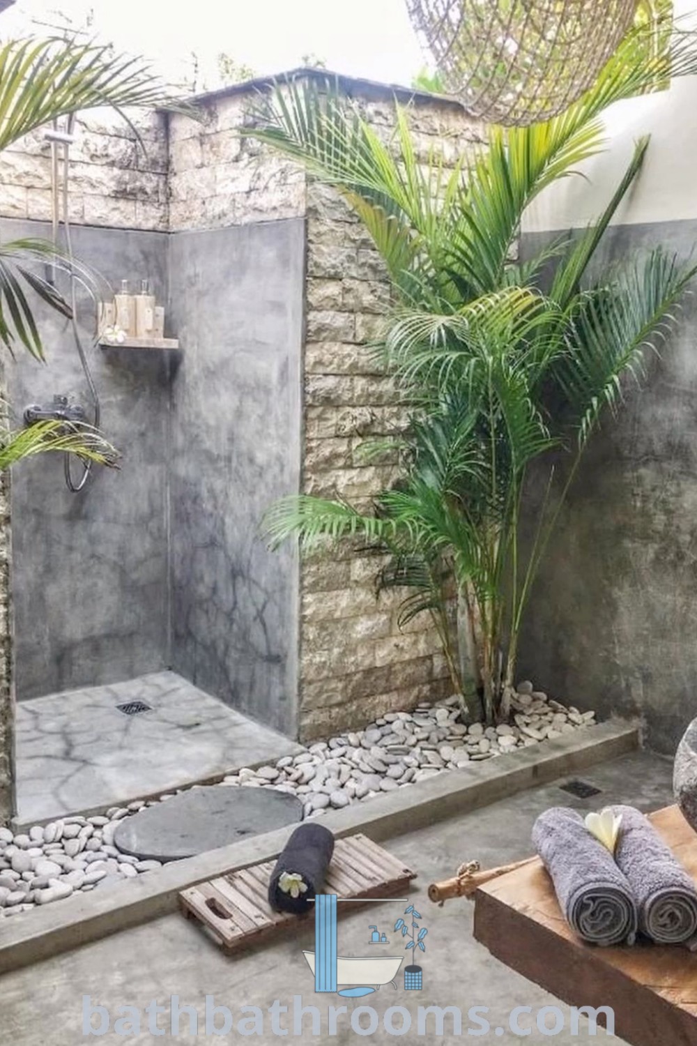 An inviting outdoor shower enclosure designed with stylish decor and a cozy aesthetic, perfect for transforming outdoor spaces. Featuring outdoor toilets and bathtubs, this design offers unique ideas for your home, emphasizing functionality and comfort. Explore inspiring outdoor bathroom designs at bathbathrooms.com.