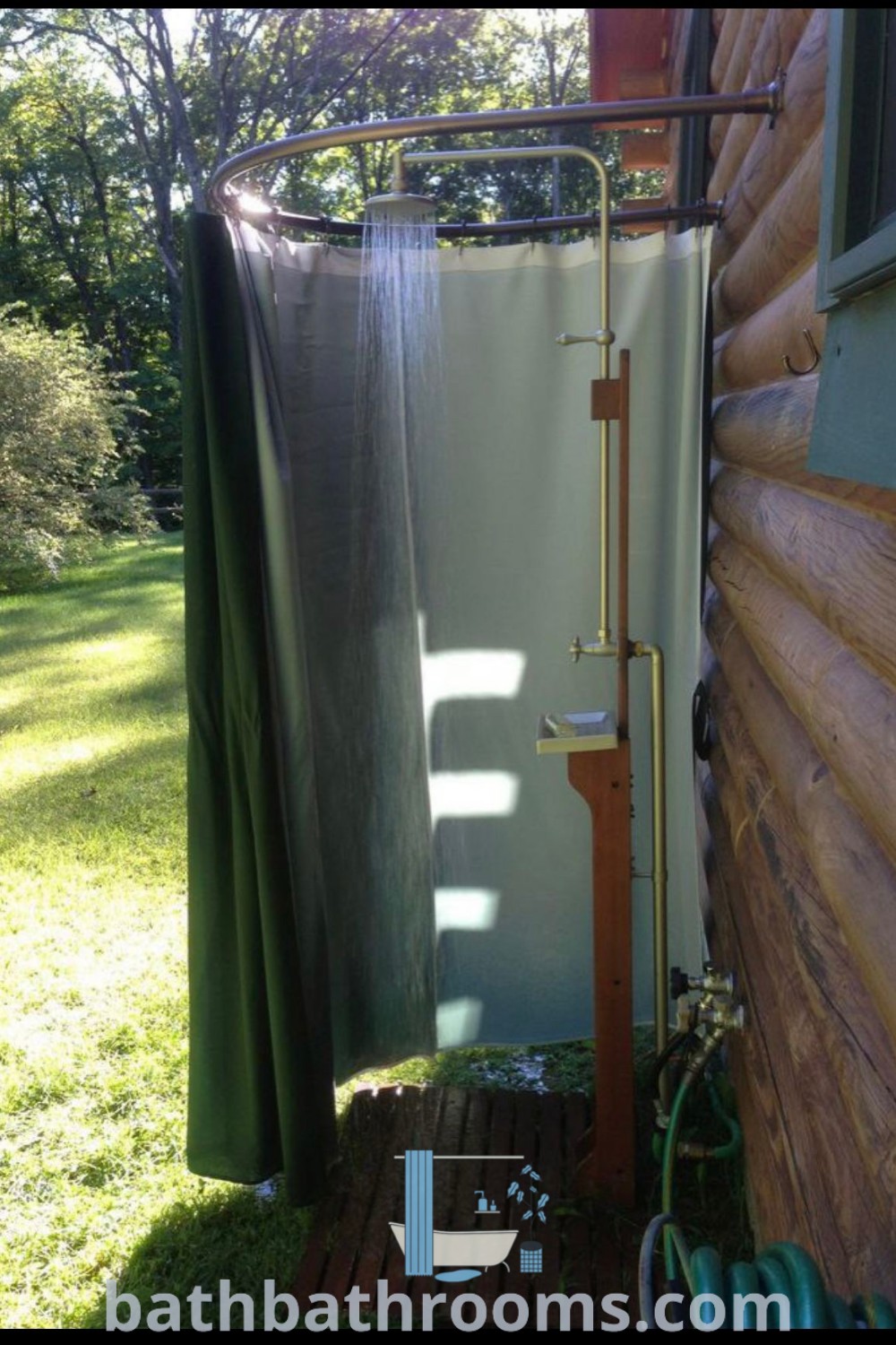 An outdoor shower in front of a wooden house featuring green curtains, showcasing unique ideas for outdoor baths and shower design. Explore cozy aesthetic inspirations and DIY projects for your home at bathbathrooms.com.