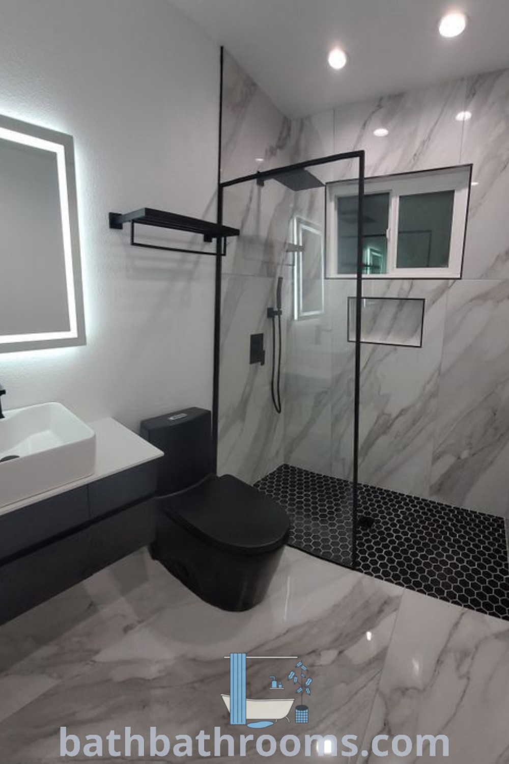 A modern bathroom showcasing white marble walls and floors with grey and black design elements. The decor emphasizes cozy aesthetics and stylish contrasts, reflecting inspiring small bathroom ideas. Explore more about these decor ideas at bathbathrooms.com.