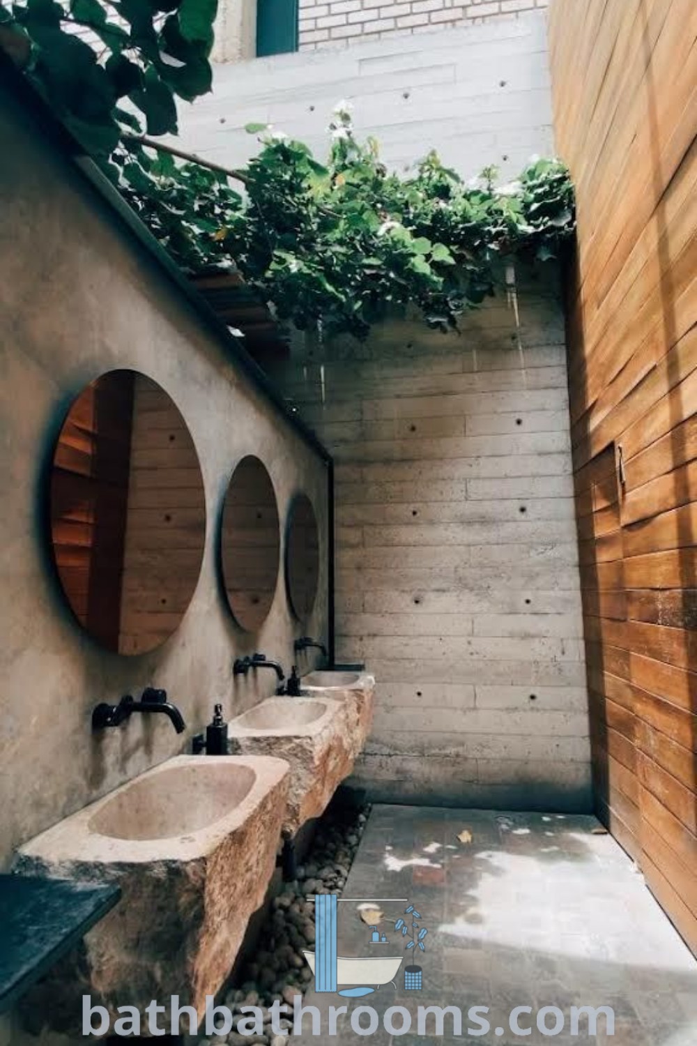 A modern bathroom featuring two sinks and three mirrors, showcasing a stylish courtyard wash basin design. Ideal for open restaurant designs and ultra-modern bathrooms, this setup combines functionality and comfort, demonstrating inspiring ideas for small wash basins. Explore more at bathbathrooms.com.