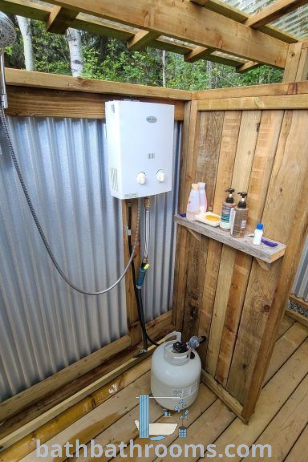 A rustic outdoor shower in the middle of a wooden deck with metal walls and roofing, showcasing unique outdoor toilet and shower ideas. This cozy design merges aesthetics with functionality, providing a perfect setup for your outdoor bathroom needs. Discover more decor inspirations at bathbathrooms.com.