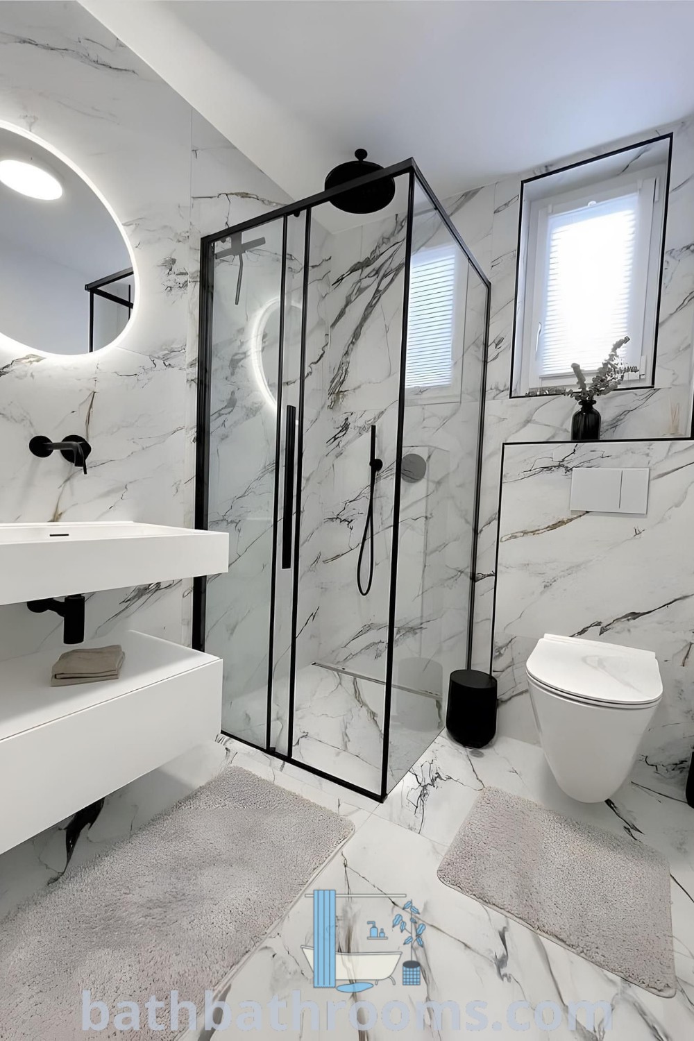 A white bathroom featuring elegant marble walls and floors, showcasing modern toilet and bathroom design trends. This luxurious decor combines functionality and style, providing ideas to maximize both aesthetic and space. For more inspiring designs, visit bathbathrooms.com.