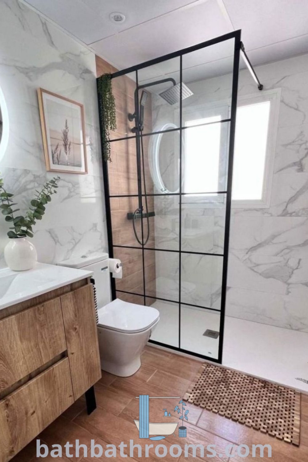 A modern small bathroom design showcasing a toilet, sink, and shower stall, emphasizing functionality and style. This image provides inspiring decor ideas for small spaces, perfect for transforming your home. Discover more unique ideas at bathbathrooms.com.