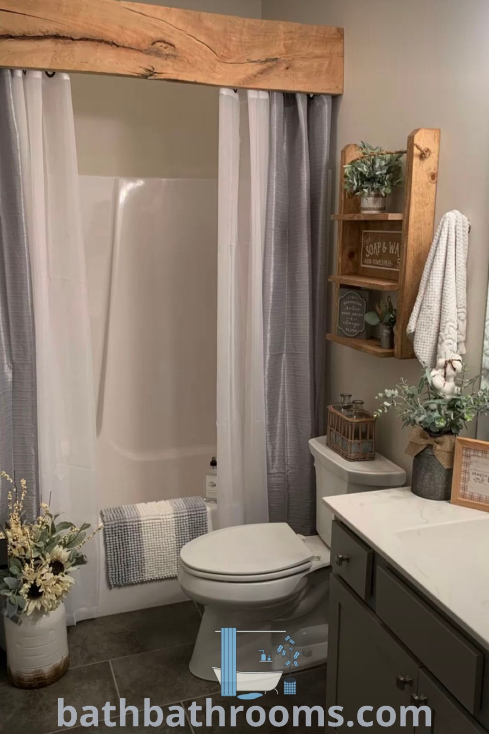 A cozy bathroom featuring a white toilet, bathtub, and shower head on a wooden frame, showcasing bathroom farmhouse style and decor ideas. Explore unique inspirations for boys