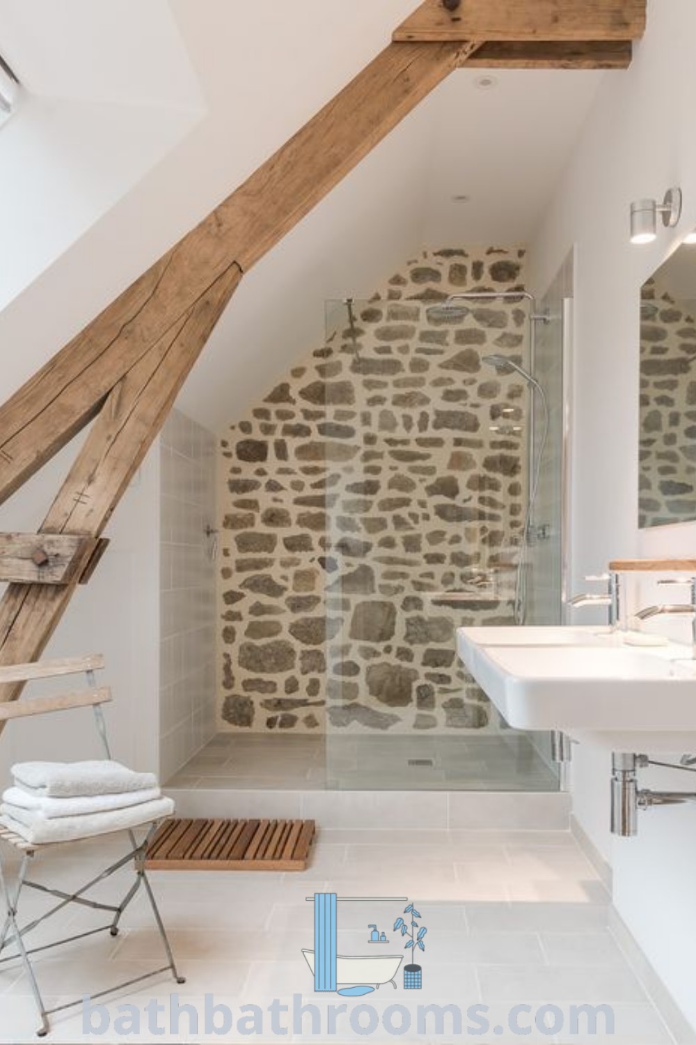 A cozy attic bathroom featuring stone walls and exposed wooden beams, showcasing minimalist and contemporary decor inspirations. This unique design maximizes style and space, perfect for those seeking ideas for a perfect style fusion. Discover more decor ideas at bathbathrooms.com.