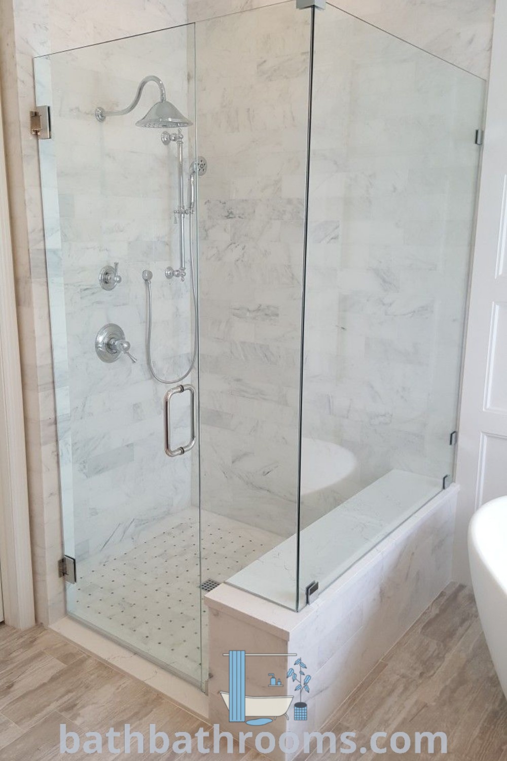 A stylish walk-in shower beside a white bathtub in a wooden floored bathroom, highlighting a beautifully remodeled vanity. The frameless shower glass doors enhance the space