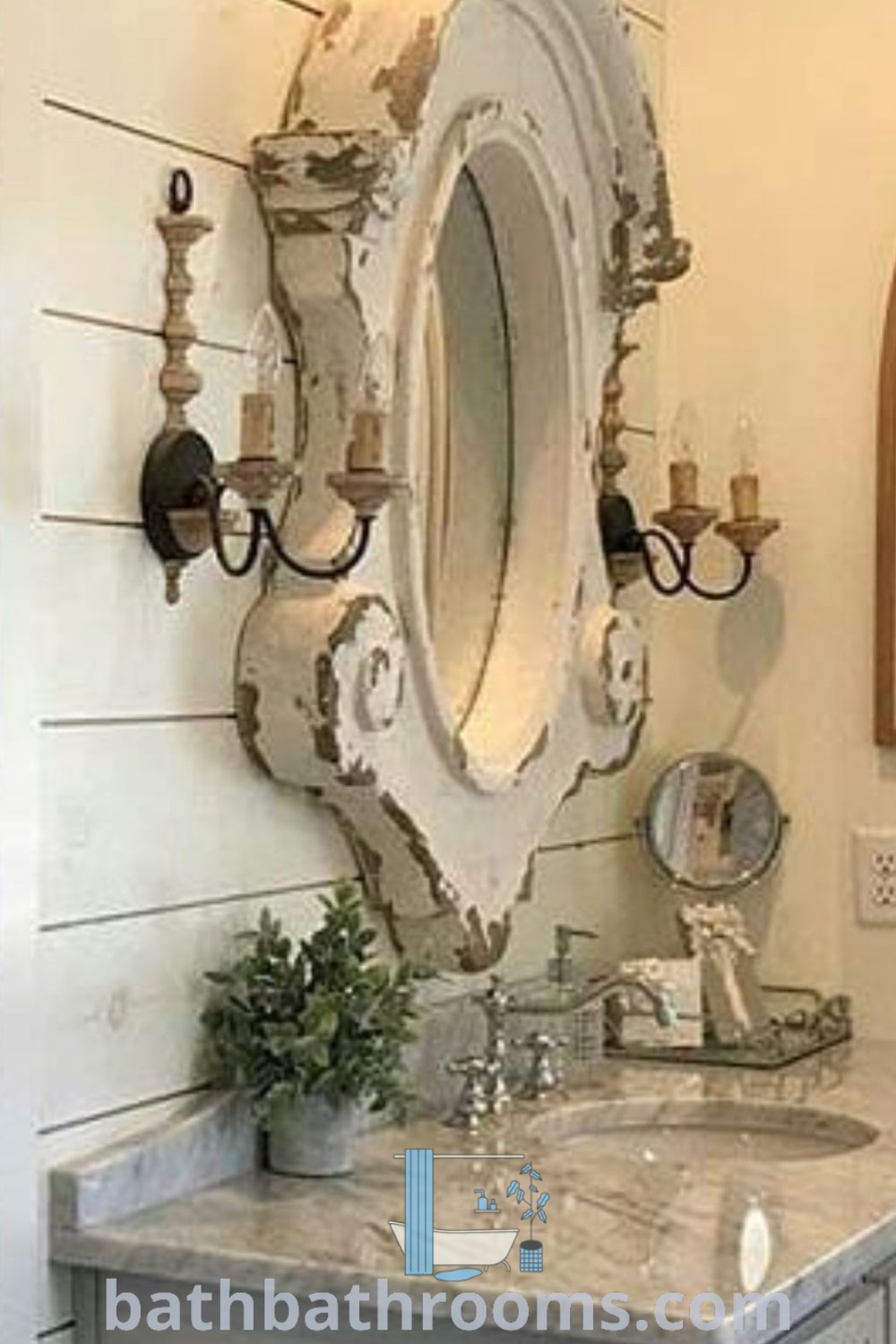 An elegant bathroom showcasing a sink and mirror on the wall, designed with cozy decor ideas that create an inviting atmosphere. Explore more inspiring designs and tips for your home at bathbathrooms.com.