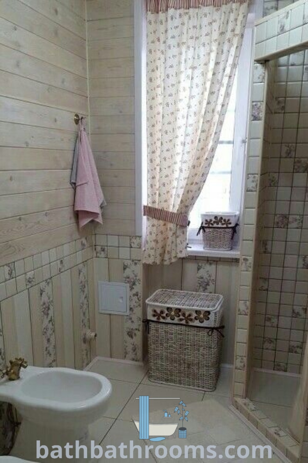 A stylish white toilet in a Mexico-inspired bathroom next to a sink and shower stall under a window, showcasing cozy home decor ideas. Explore design trends and inspirations for small spaces at bathbathrooms.com.