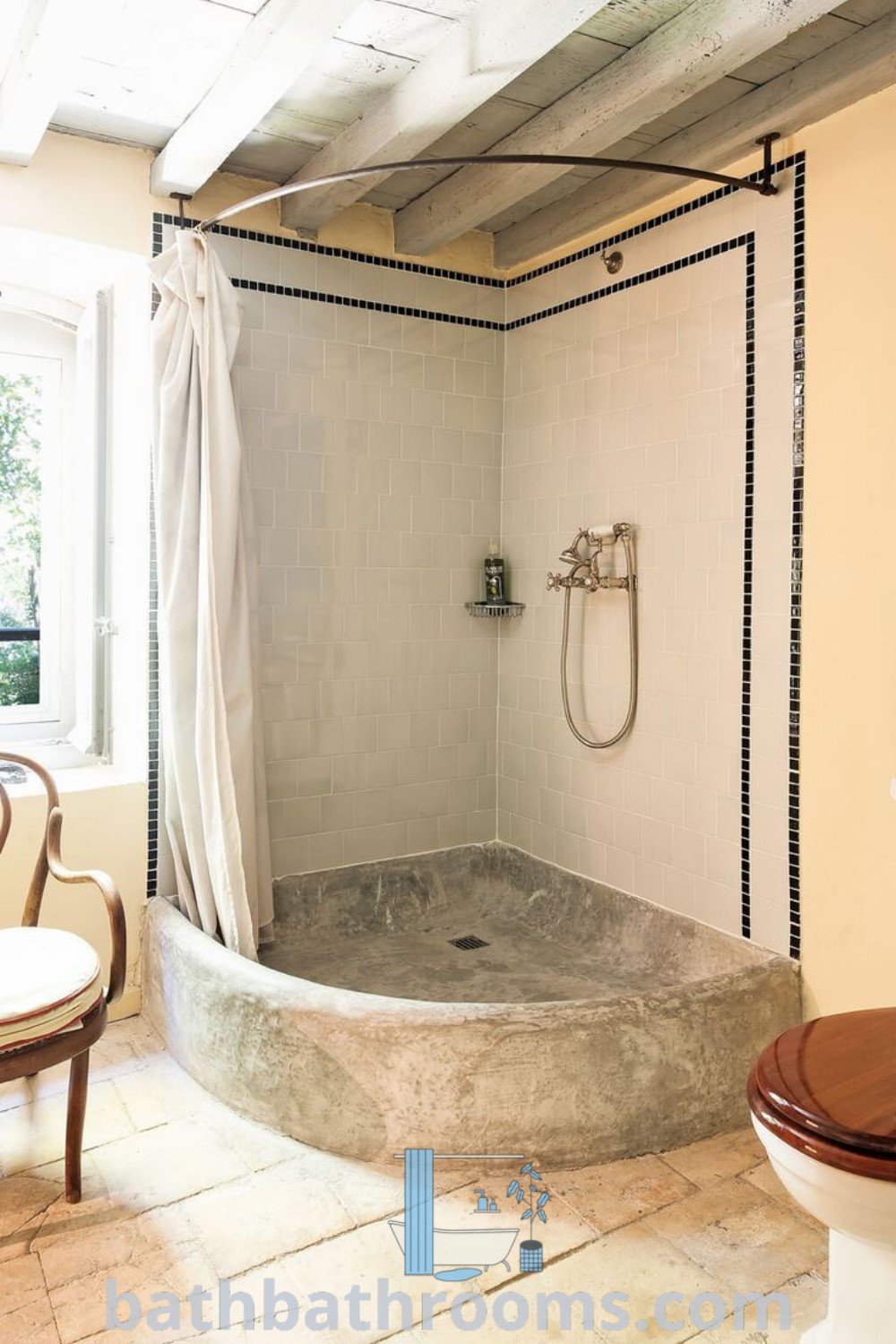 An elegant bathroom with a toilet and stand-up shower designed in the French Country style, showcasing luxurious decor inspirations from European farmhouse aesthetics. Discover more unique ideas for your home at bathbathrooms.com.