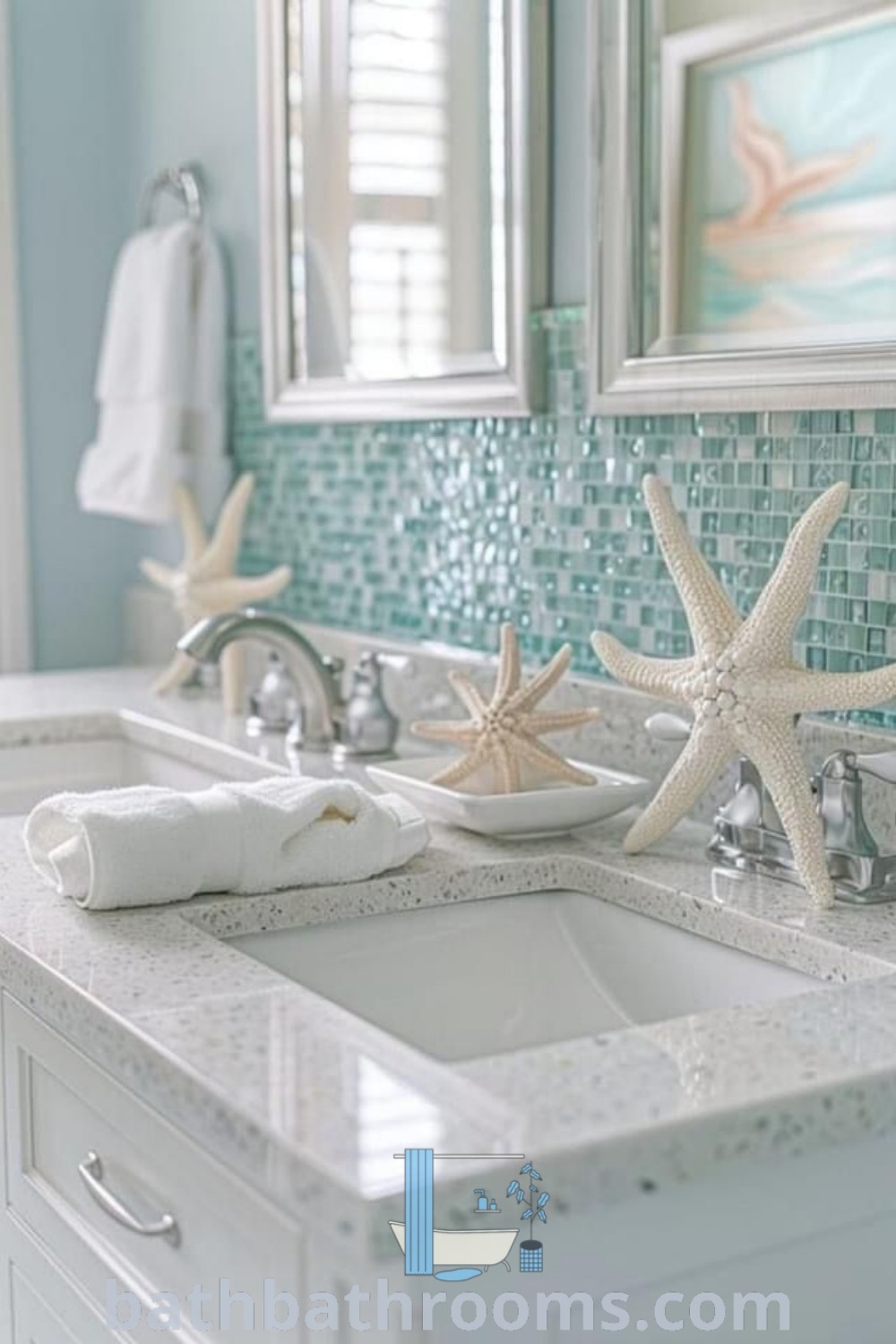 A chic blue and white coastal bathroom with two starfish on the counter, highlighting unique ideas and inspirations for sea theme bathroom decor. Explore more coastal bathroom tile ideas and design tips at bathbathrooms.com.