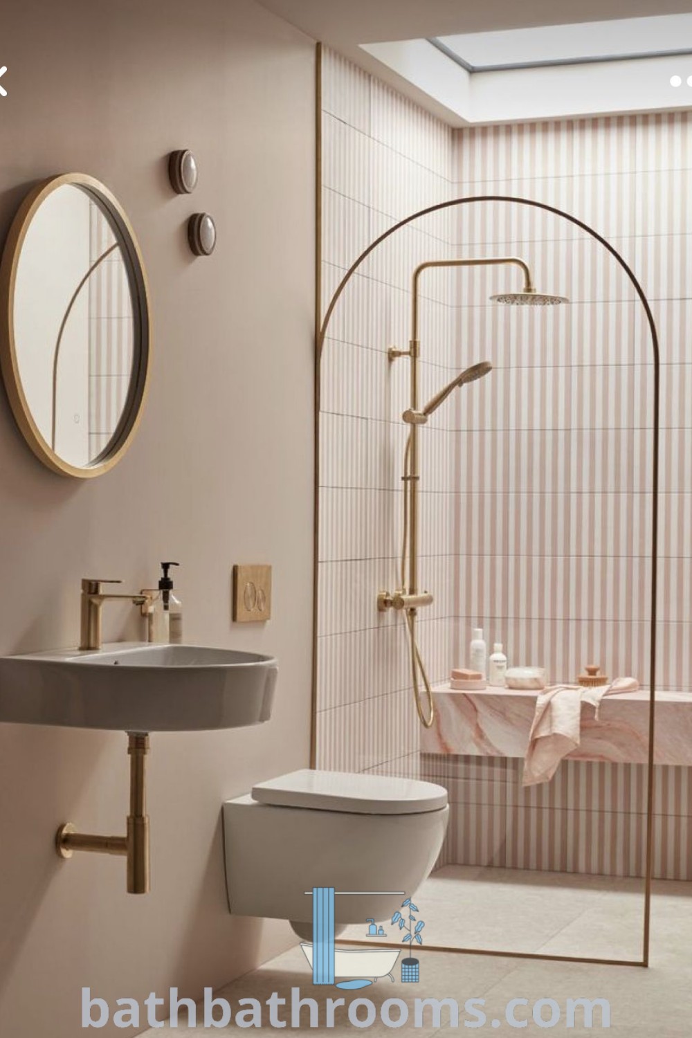 A chic bathroom featuring black bathroom mirrors, bathroom taps, brass bathroom accessories, and a comfortable layout centered around a shower and round mirror. Ideal for ensuites or loft bathrooms, this design provides cozy aesthetics and functional style. Discover more ideas at bathbathrooms.com.