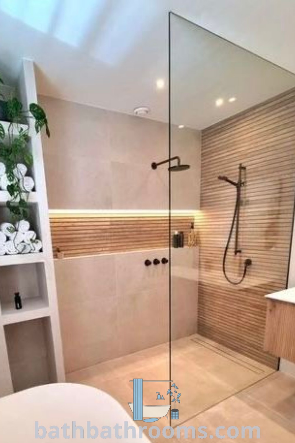 A modern bathroom showcasing a walk-in shower next to a sink, representing innovative bathroom ideas with aesthetic and functional benefits. Explore modern small bathrooms and inspiring design ideas at bathbathrooms.com.