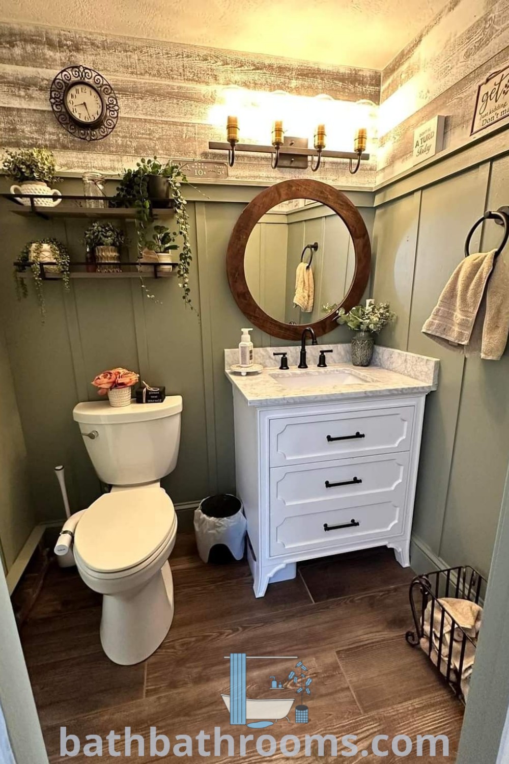 A cozy bathroom with a white toilet and a sink under a mirror, complemented by elegant wallpaper accent designs. This scene showcases unique bathroom decor ideas and inspirations for maximizing style and space. Discover more inspiring accents at bathbathrooms.com.