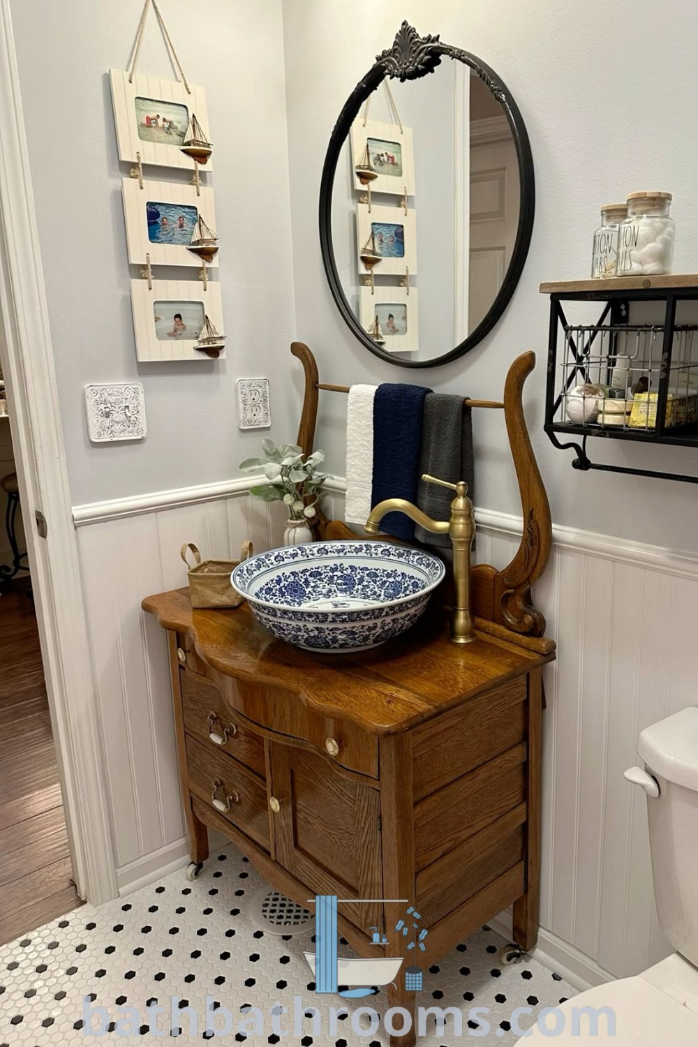 An antique washstand bathroom vanity featuring a sink, mirror, and toilet, showcasing vintage charm and practical design ideas. Ideal for a cozy bathroom makeover, this unique piece adds style and elegance to any space. Dive into more decor ideas at bathbathrooms.com.
