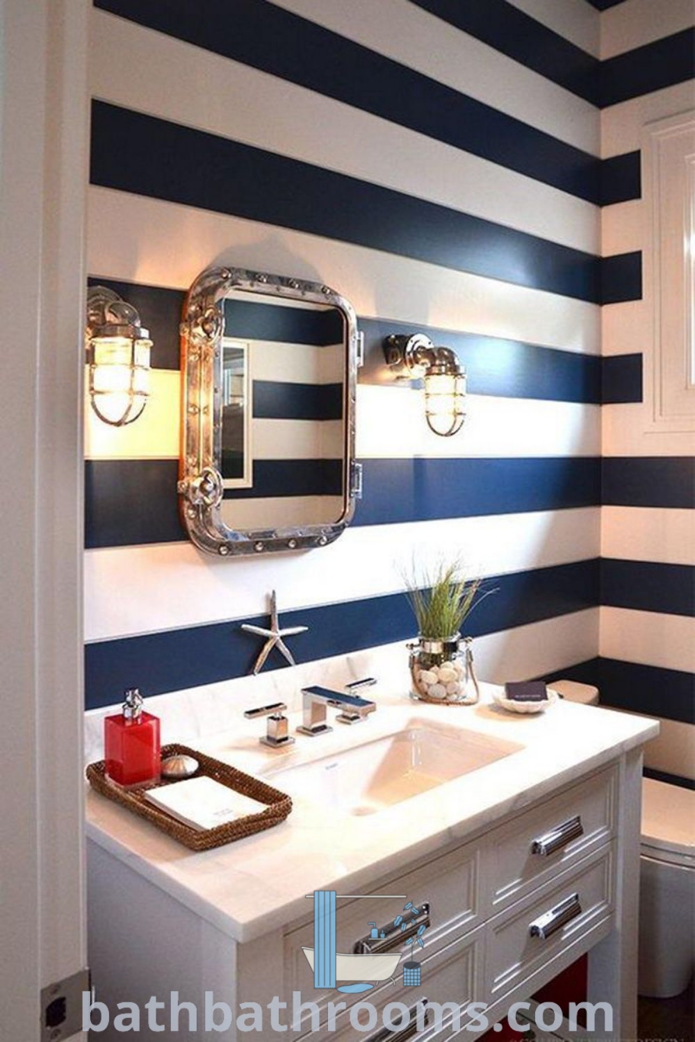 A nautical-inspired bathroom featuring blue and white striped walls, embodying chic beach house decor. The design showcases cozy ideas and decor inspirations perfect for nautical bathrooms. Discover unique and functional design tips at bathbathrooms.com.