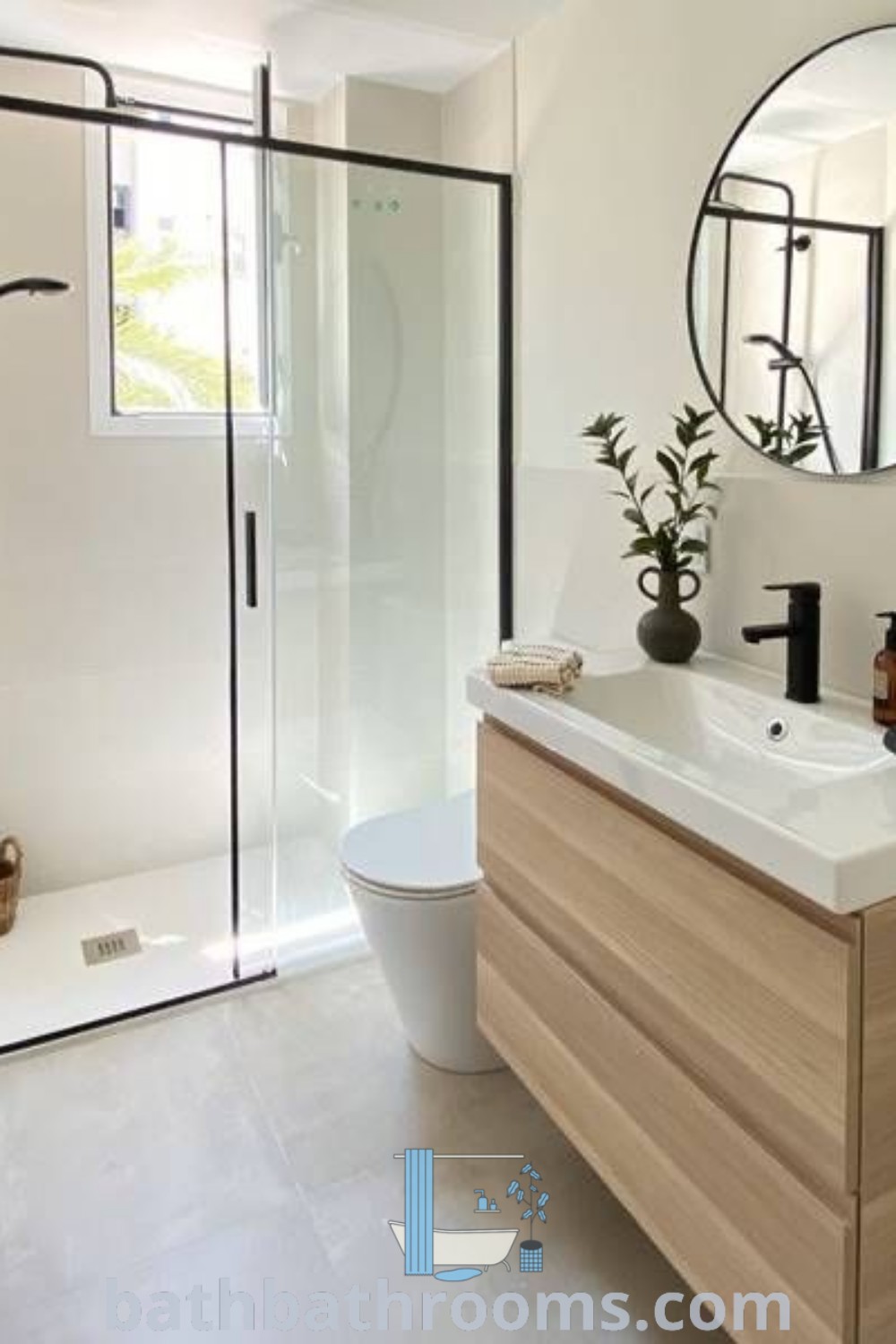 A stylish small bathroom showcasing a sink, toilet, and shower in its own area, designed with modern decor inspirations. This layout maximizes space and aesthetics, perfect for small bathroom ideas and transformations. Discover more unique ideas for your home at bathbathrooms.com.